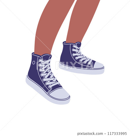 Close-up of human feet wearing dark blue sneakers, perfect for skateboarding. 117333995