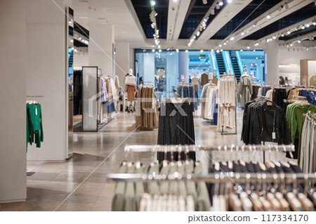 Clothing department store indoor interior in shopping mall Clothing department store indoor interior in shopping mall 117334170