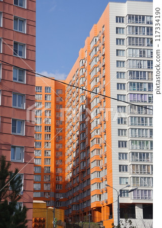Sleeping area with high-rise buildings on a sunny spring day, Vidnoe, Moscow region, May 2022. 117334190