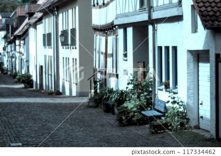 old narrow street with old houses 117334462