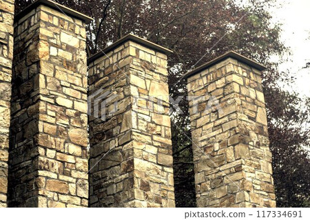 old brick wall in the park old brick wall in the park 117334691