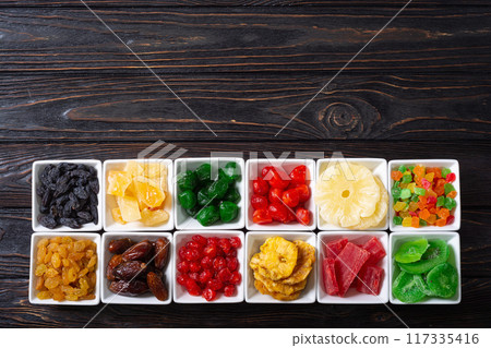 Group of dried and candied fruit in bowl Group of dried and candied fruit in bowl 117335416