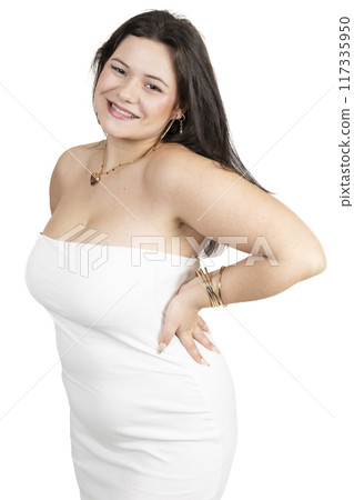 Curvy girl posing with a black dress and some flowers in her hand 117335950