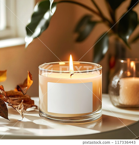 Candle jar mockup, burning candle mockup with white label, scented candle template in cozy home interior Candle jar mockup, burning candle mockup with white label, scented candle template in cozy home interior 117336443