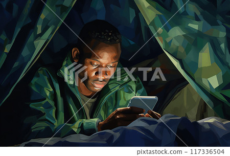 person in tent using mobile phone, young african american man camping and use smartphone 117336504