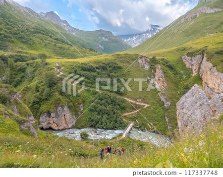 Randonnee crepuscule in the Vallee de Chaviere in Vanoise national park in France Randonnee crepuscule in the Vallee de Chaviere in Vanoise national park in France 117337748