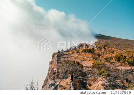 Maido with lookout over Cirque de Mafate in Reunion, France - Africa. Misty Maido with lookout over Cirque de Mafate in Reunion, France - Africa. Misty 117337959