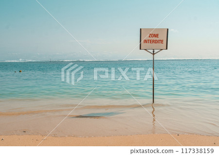 Reunion island, Africa - sign to not swim because of sharks Reunion island, Africa - sign to not swim because of sharks 117338159
