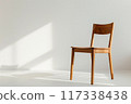 Wooden Chair in a White Room 117338438