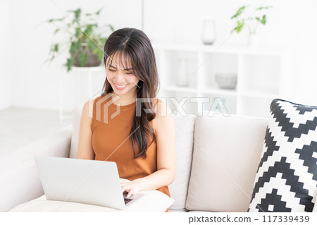 Young woman laptop computer 117339439