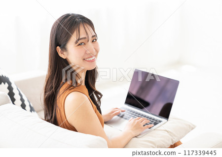 Young woman laptop computer 117339445