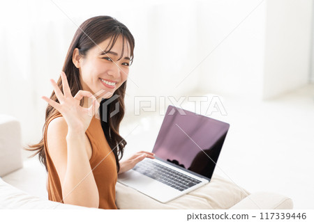Young woman laptop computer 117339446