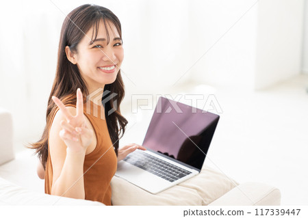Young woman laptop computer 117339447