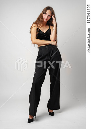 Woman in Black Top and Pants 117341205
