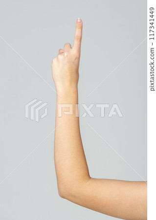 Young Woman Arm with Gesture close up Young Woman Arm with Gesture close up 117341449