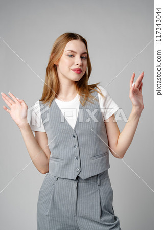 Young woman in a state of shock or surprise 117343044