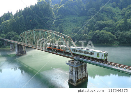The Tadami Line crossing the fifth bridge over the Tadami River The Tadami Line crossing the fifth bridge over the Tadami River 117344275