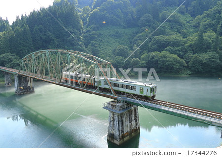 The Tadami Line crossing the fifth bridge over the Tadami River The Tadami Line crossing the fifth bridge over the Tadami River 117344276