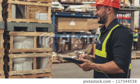 Close up Hispanic men hands using pen touch smart tablet Warehouse management logistics counting checking products on inventory shelf. Man hands worker check stock control in distribution storage Close up Hispanic men hands using pen touch smart tablet Warehouse management logistics counting checking products on inventory shelf. Man hands worker check stock control in distribution storage 117344538