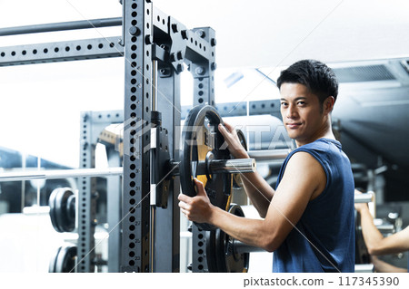 Sports gym, training gym, male, muscle training, portrait Sports gym, training gym, male, muscle training, portrait 117345390