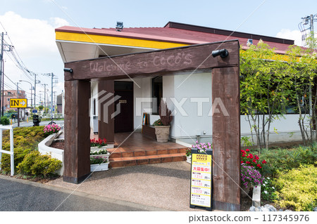Entrance to Coco's Mitaka Osawa store, clear summer sky, Mitaka, Tokyo 117345976