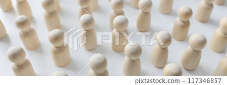 Wooden figures of people on white background 117346857