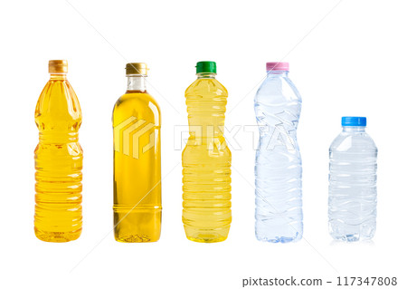 Vegetable oil and water in different bottle for cooking isolated on white background. Vegetable oil and water in different bottle for cooking isolated on white background. 117347808