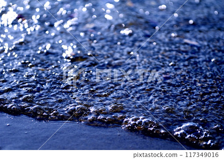 Blue spilling abstract wave of liquid, plastic, water 117349016