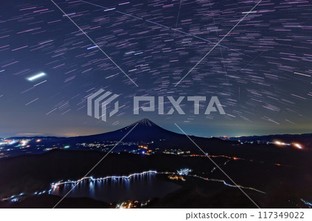 Night view of Mt. Fuji and Lake Saiko from Mount Setsugatake in the Misaka Mountains and the starry sky Night view of Mt. Fuji and Lake Saiko from Mount Setsugatake in the Misaka Mountains and the starry sky 117349022