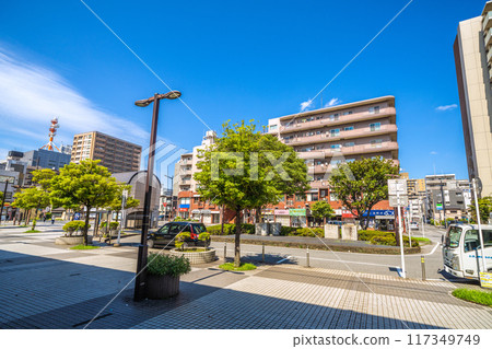 Chiba cityscape in Japan. View of Hon-Chiba Station in Nagasu, Chuo Ward, Chiba City. The government district, including the fire station, is in the background on the left. 117349749