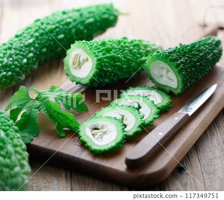 Image of cut summer vegetable bitter melon (bitter melon) 117349751