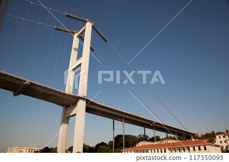 Magnificent Bosphorus bridge connecting the Asian and European sides, bottom view detail, Istanbul Turkey Magnificent Bosphorus bridge connecting the Asian and European sides, bottom view detail, Istanbul Turkey 117350095