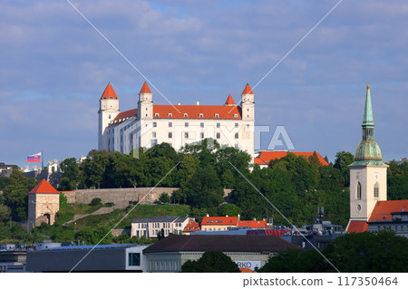Bratislava, the capital of Slovakia in Central Europe. Bratislava Castle on a rocky hill overlooking the Danube River and the city. 117350464