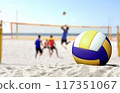 Volleyball game on sandy beach 117351067