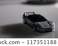 Where imagination meets reality: a solitary toy car captures the essence of childhood play 117351188