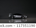 A simple yet captivating scene featuring a toy car, inviting all to relive their youthful explorations 117351190