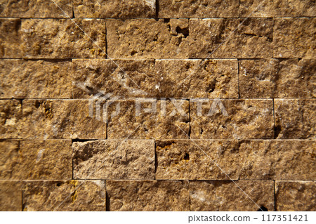 Cutting beige organic marble wall rectangular, seamless lined up 117351421