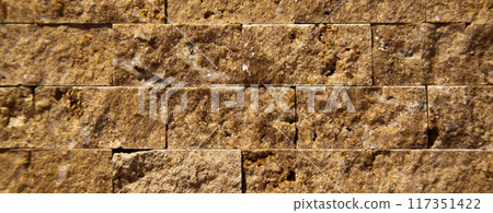 Cutting beige organic marble wall rectangular, seamless lined up Cutting beige organic marble wall rectangular, seamless lined up 117351422
