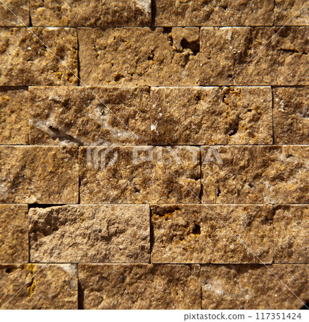 Cutting beige organic marble wall rectangular, seamless lined up Cutting beige organic marble wall rectangular, seamless lined up 117351424
