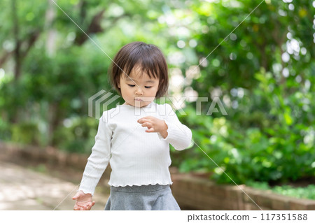 A girl who skips dandelion's fluff A girl who skips dandelion's fluff 117351588