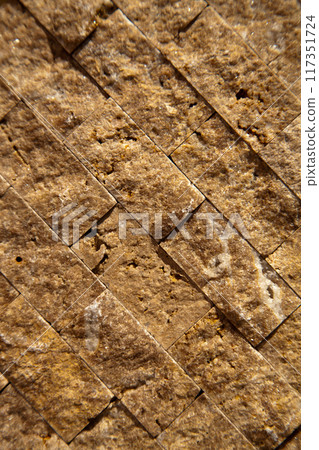Cutting beige organic marble wall rectangular, seamless lined up Cutting beige organic marble wall rectangular, seamless lined up 117351724