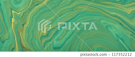 Abstract fluid art background green and yellow colors. Liquid marble. Acrylic painting with emerald gradient and splash. 117352212