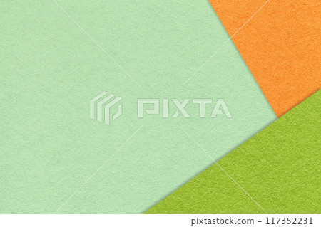 Texture craft light mint color paper background with orange and green border. Vintage abstract olive cardboard. Texture craft light mint color paper background with orange and green border. Vintage abstract olive cardboard. 117352231