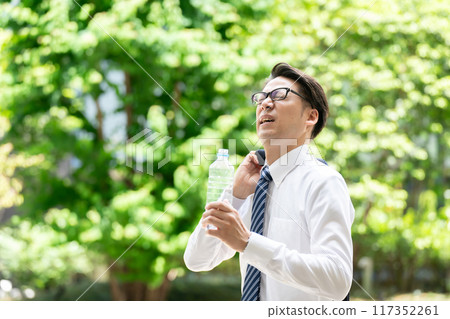 Businessman, extreme heat, heat stroke, water Businessman, extreme heat, heat stroke, water 117352261