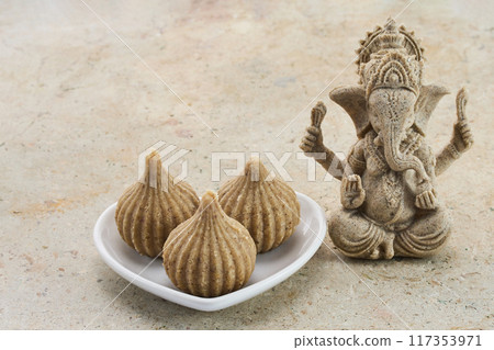 Ganesh Chaturthi Festival. Ganesha with Modak Sweets Ganesh Chaturthi Festival. Ganesha with Modak Sweets 117353971