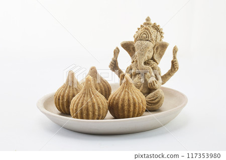 Ganesh Chaturthi Festival. Lord Ganesha and Modak 117353980