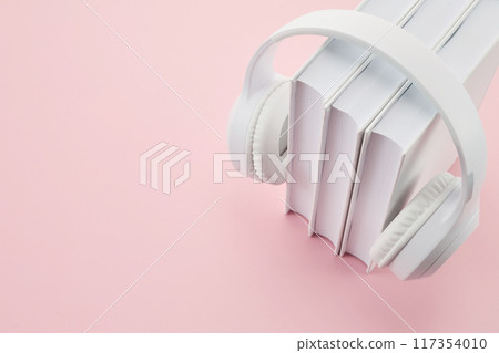 Audio books concept. Books and Headphones 117354010