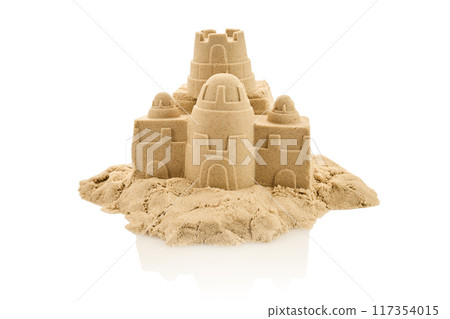 A detailed sandcastle sculpture on a white background, A detailed sandcastle sculpture on a white background, 117354015