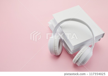 Audio books concept. Headphones on Books 117354025
