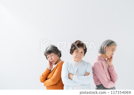 Worried senior woman Worried senior woman 117354069